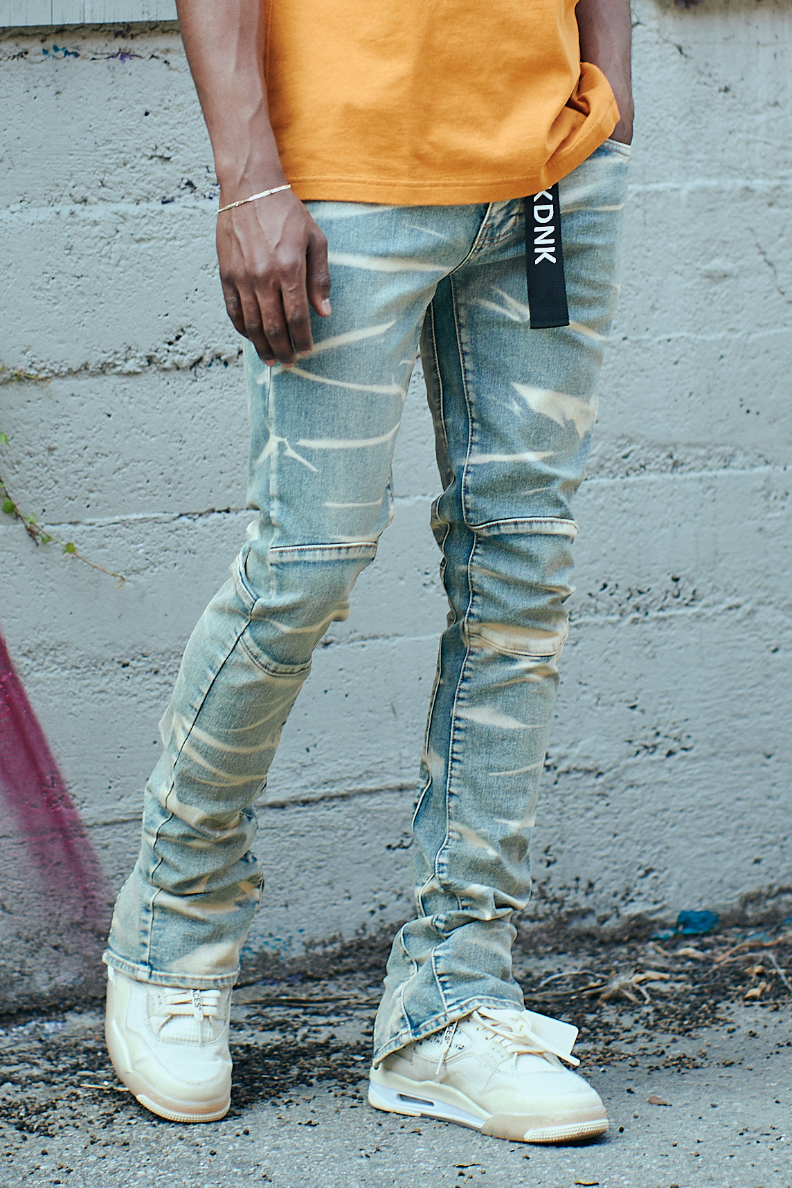 5-pocket skinny stacked jeans in stretch denim  Long zippers in back of bottom parts of pants w/ *backing inside