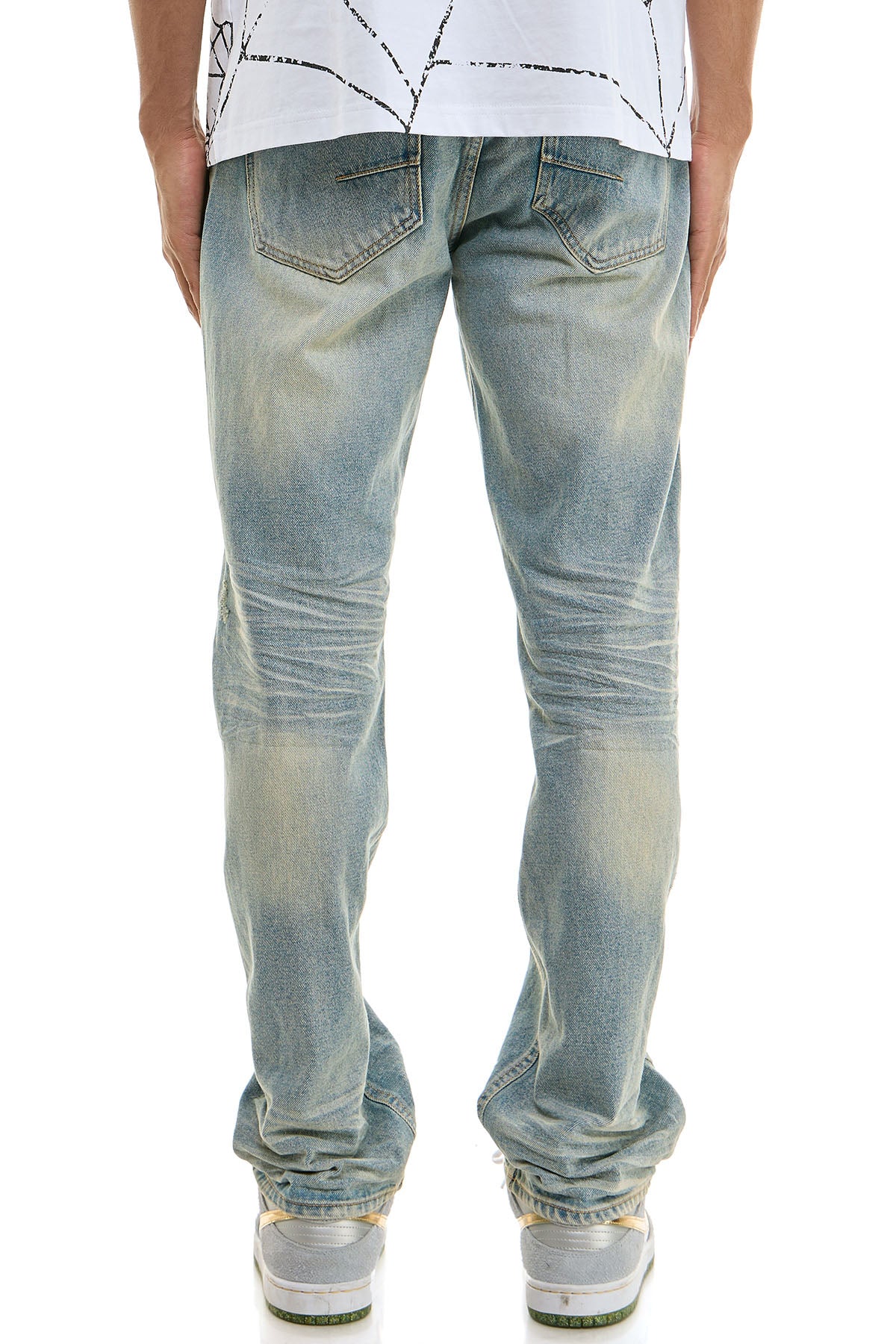 DISTRESSED SLIM JEANS