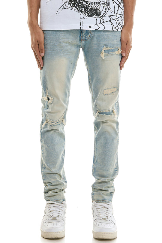 DISTRESSED SKINNY JEANS
