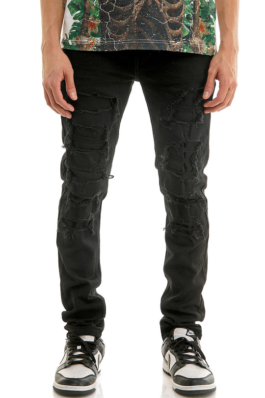 PATCHED AND DISTRESSED SKINNY PANTS