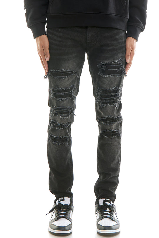 PATCHED AND DISTRESSED SKINNY JEANS