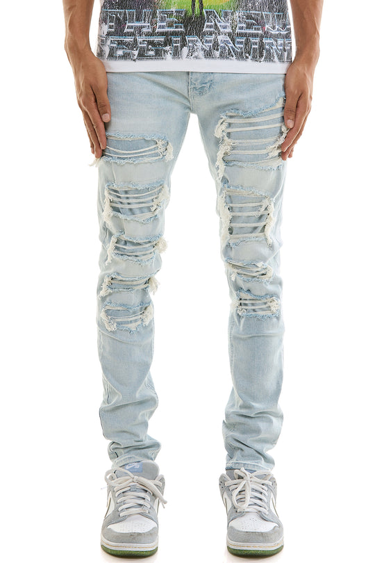 PATCHED AND DISTRESSED SKINNY JEANS