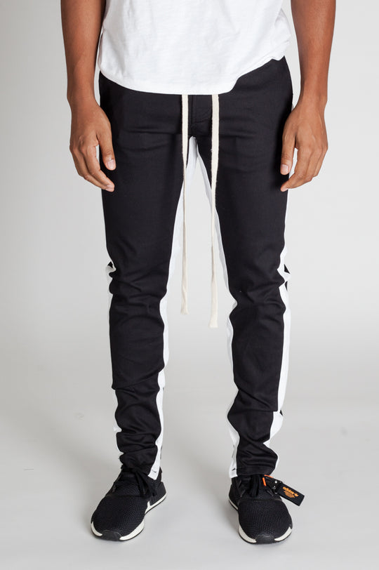 STRIPED TRACK PANTS WITH ANKLED ZIPPERS