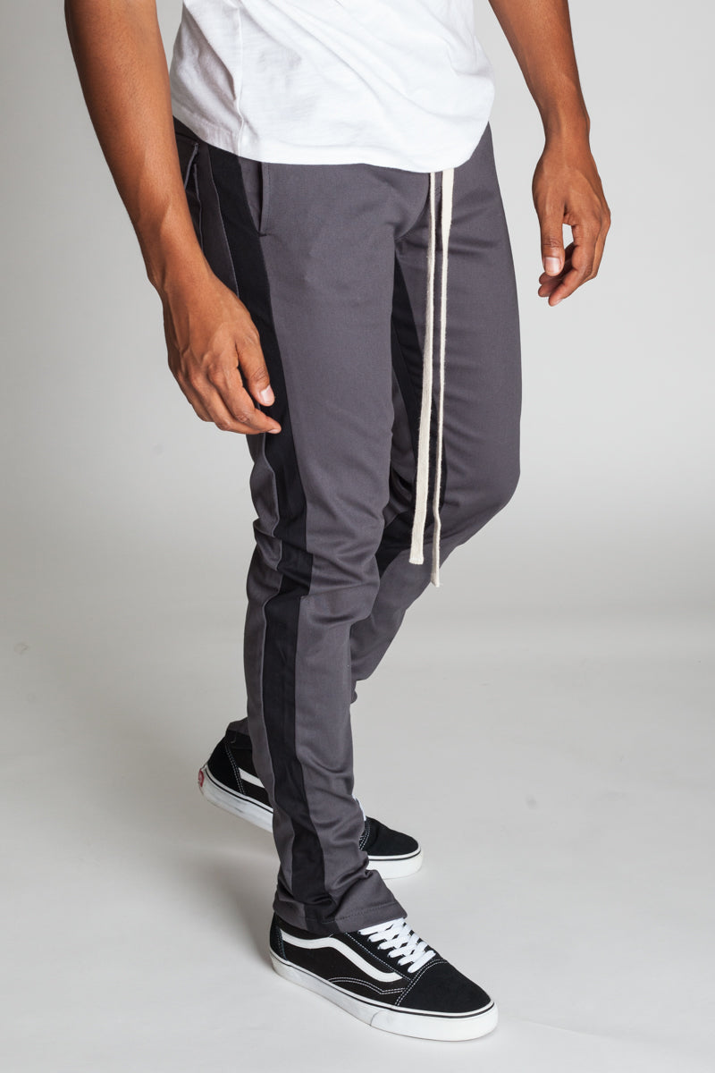 STRIPED TRACK PANTS WITH ANKLED ZIPPERS – KDNK