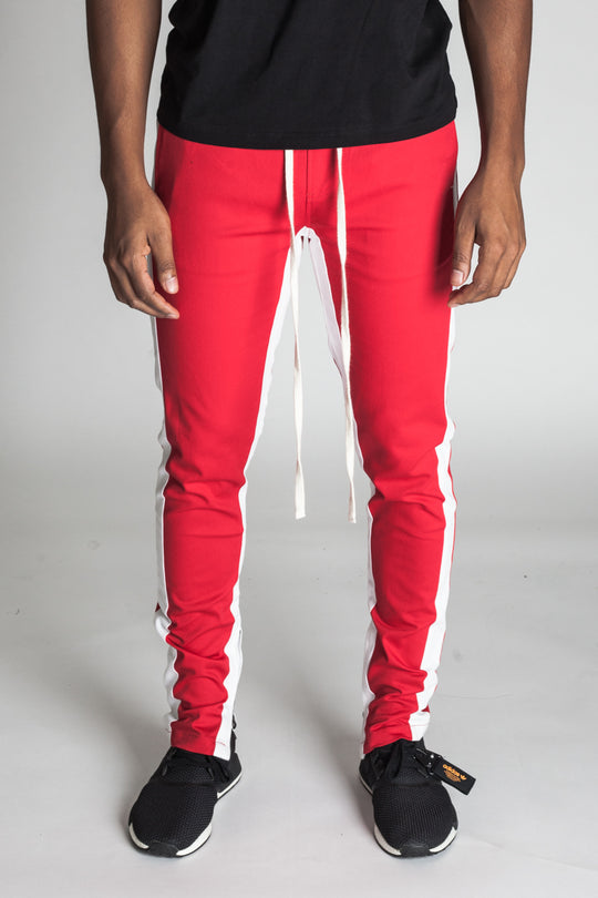 STRIPED TRACK PANTS WITH ANKLED ZIPPERS