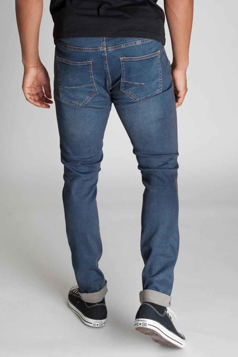 Inner Tape Destroyed Knee Skinny Jeans (Dark Slate Blue) (1636321984614)