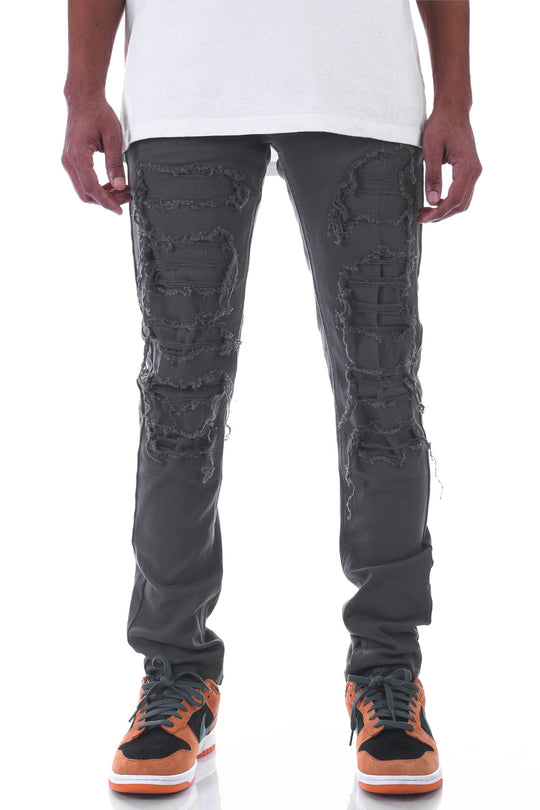 PATCHED AND DISTRESSED SKINNY PANTS