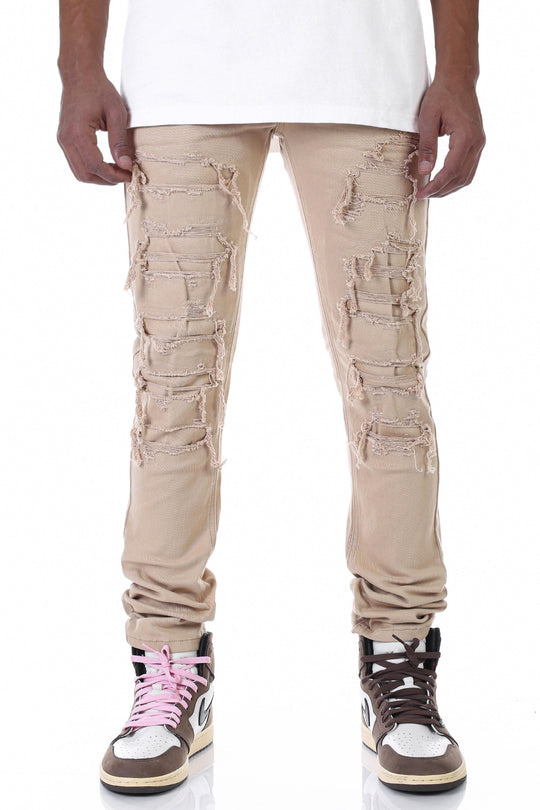 PATCHED AND DISTRESSED SKINNY PANTS