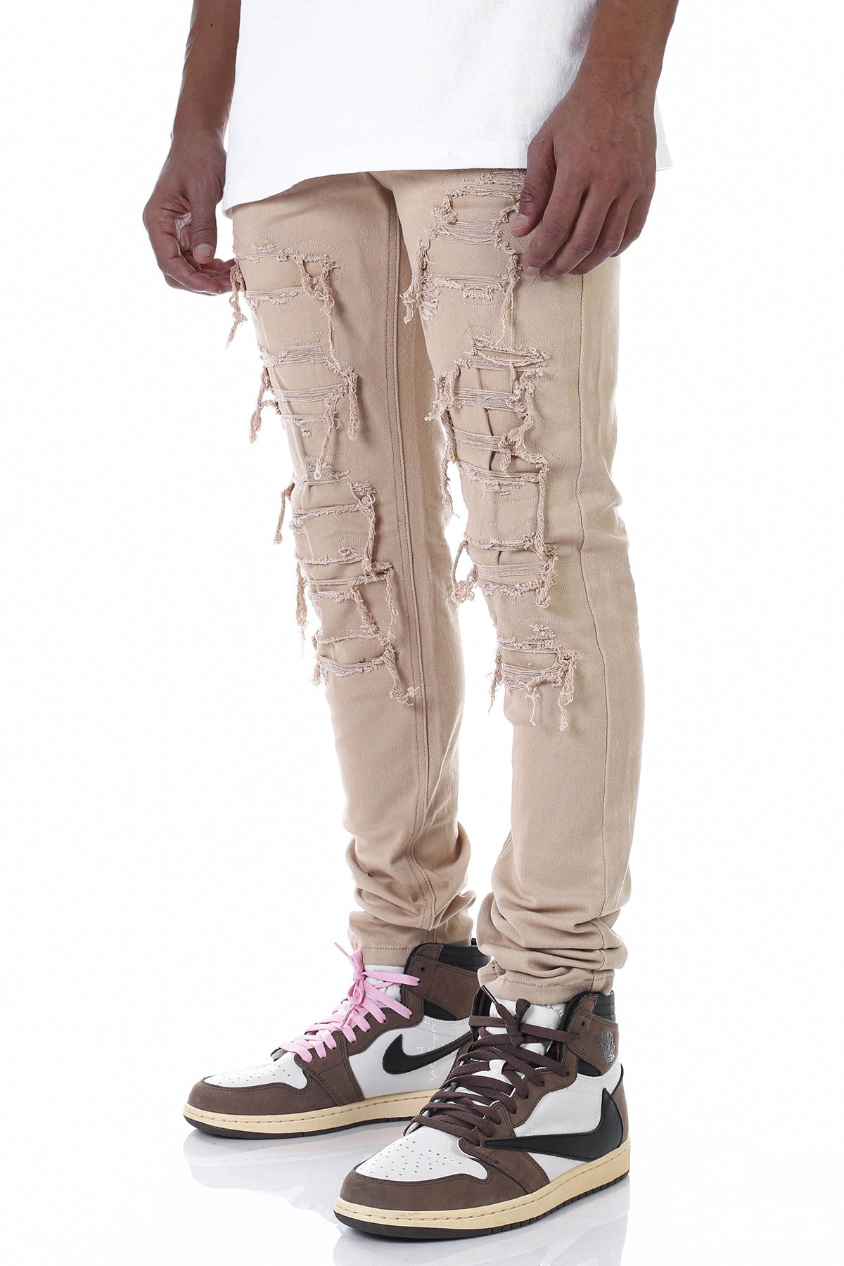 PATCHED AND DISTRESSED SKINNY PANTS