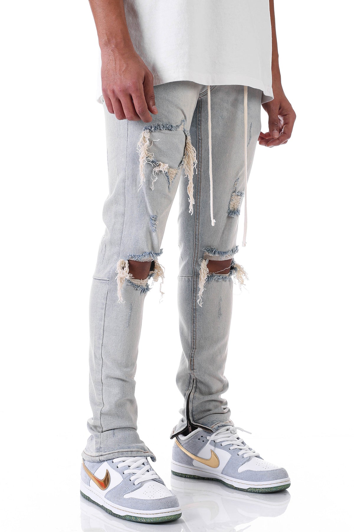 UNDER PATCH ANKLE ZIP JEANS