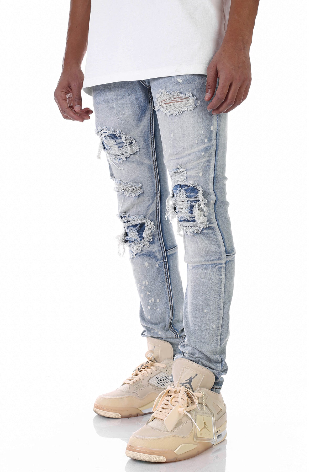 PATCHED RIPPED JEANS