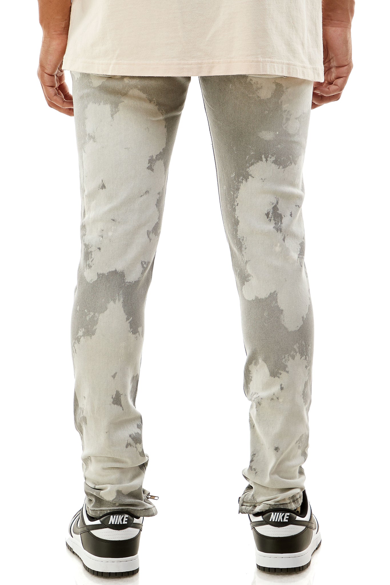 BLEACHED RIPPED ANKLE ZIP JEANS