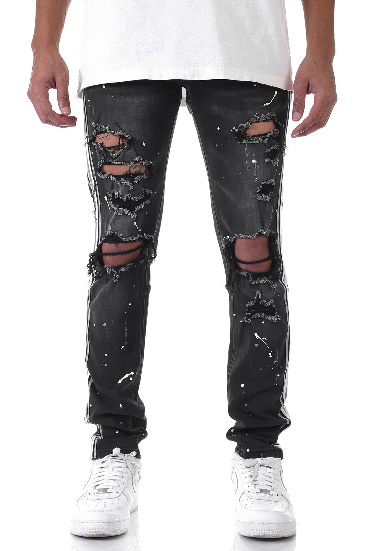 MULTI STRIPED PAINT SPLATTERED JEANS