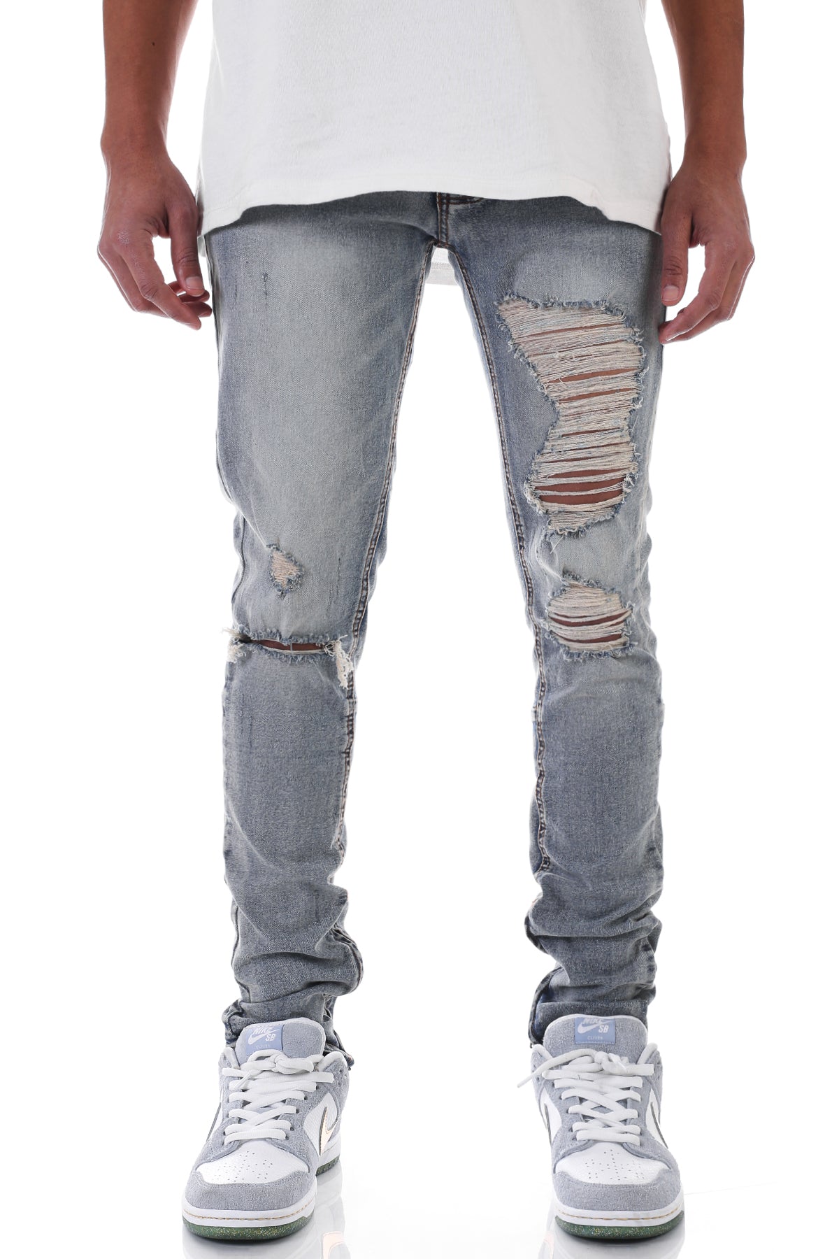 DISTRESSED ANKLE ZIP JEANS
