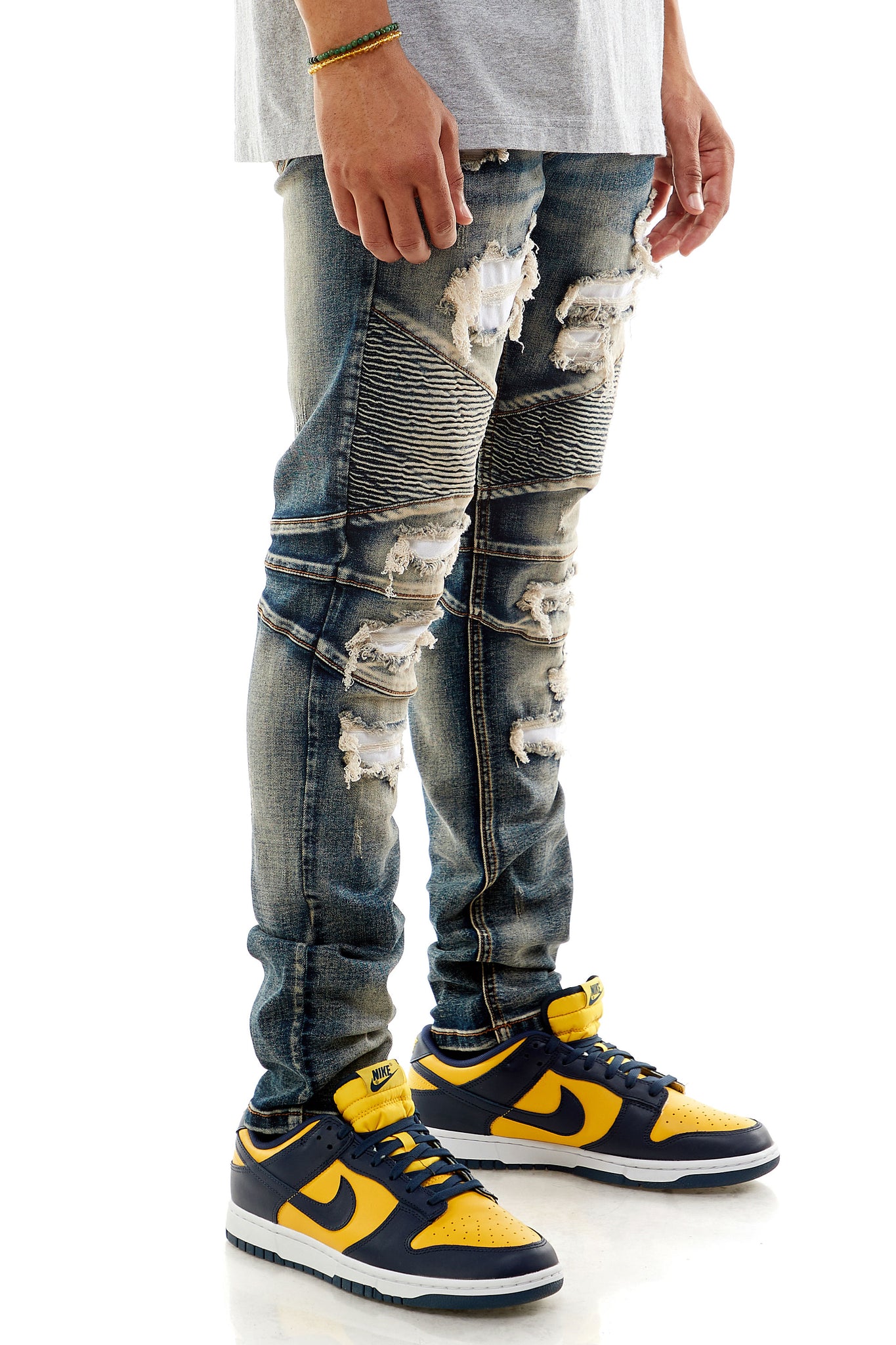 PATCHED MOTO JEANS