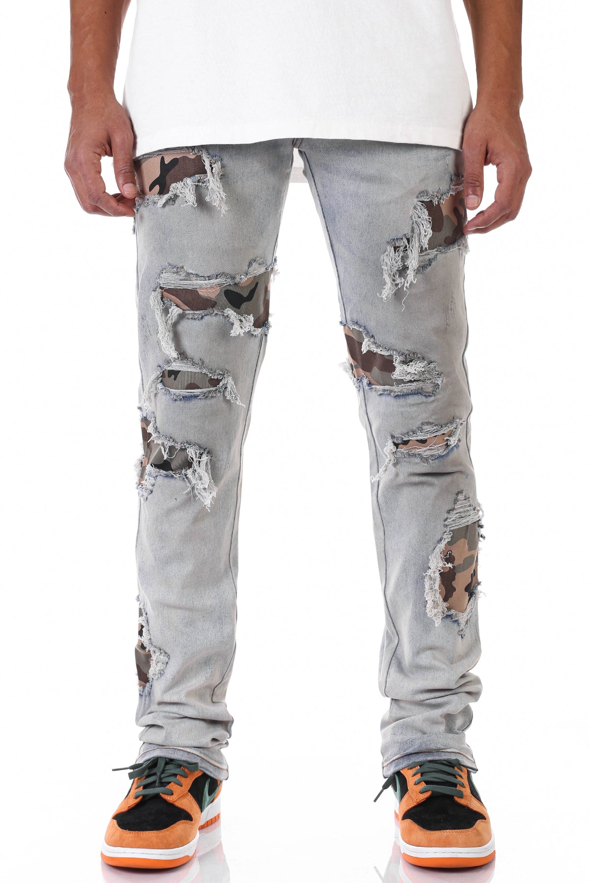 STACKED CAMO PATCH JEANS
