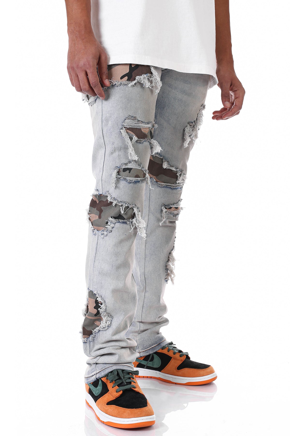 STACKED CAMO PATCH JEANS